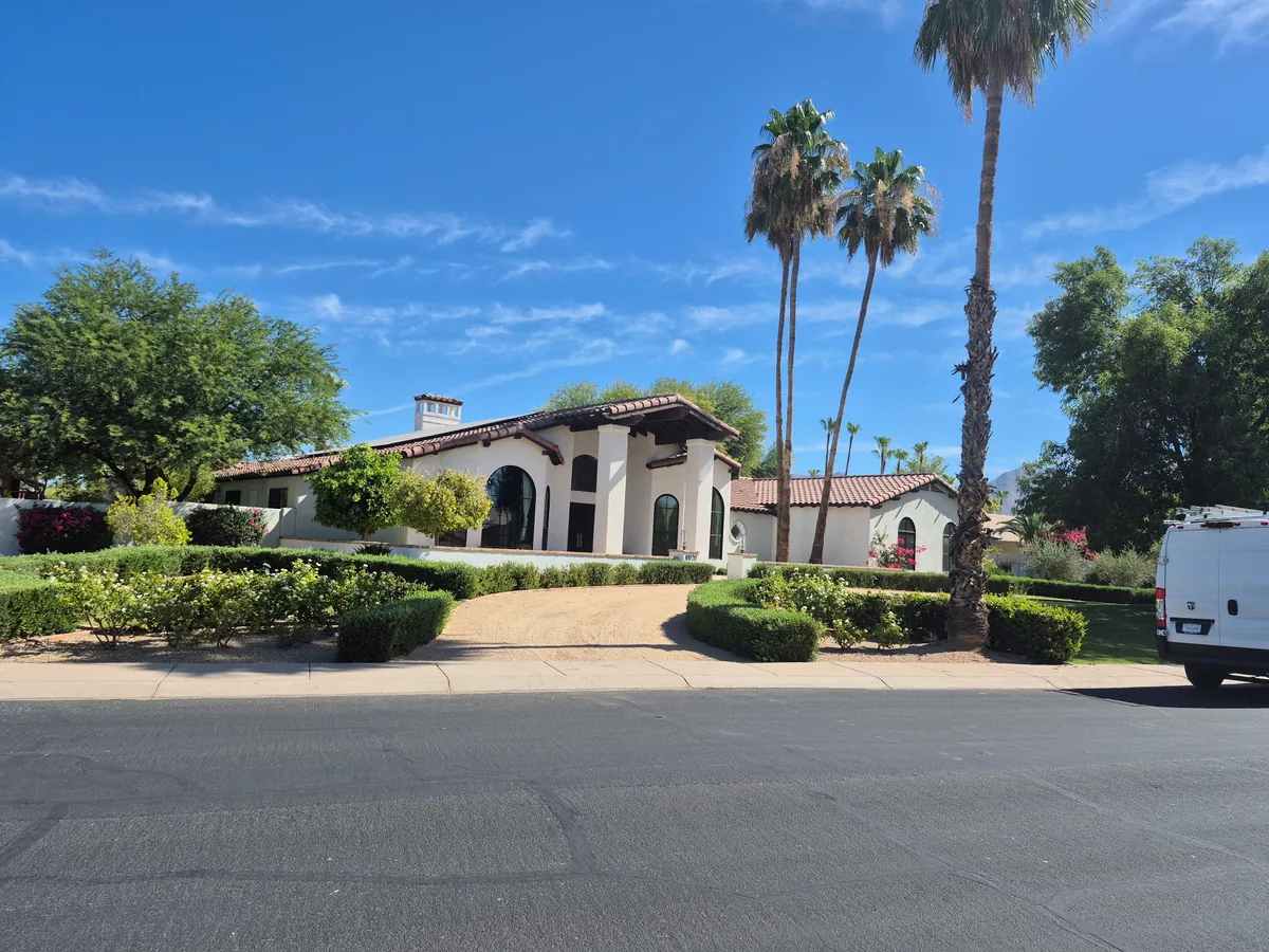 Single story Mediterranean style home exterior paint