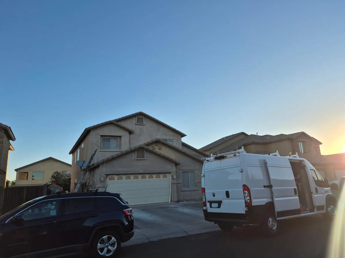 Two story stucco home exterior painting project in Phoenix
